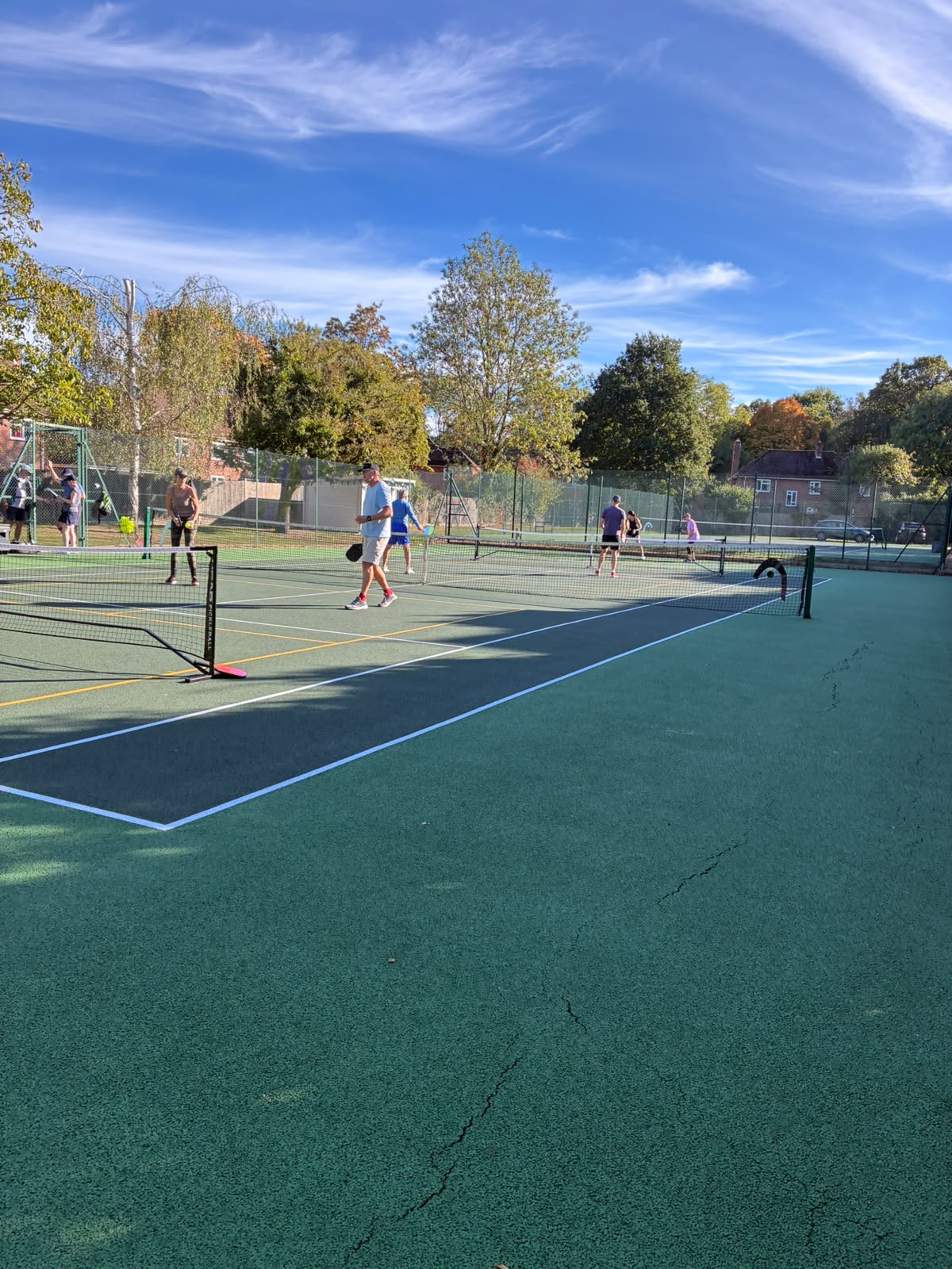 Group of players taking part in a pickleball clinic